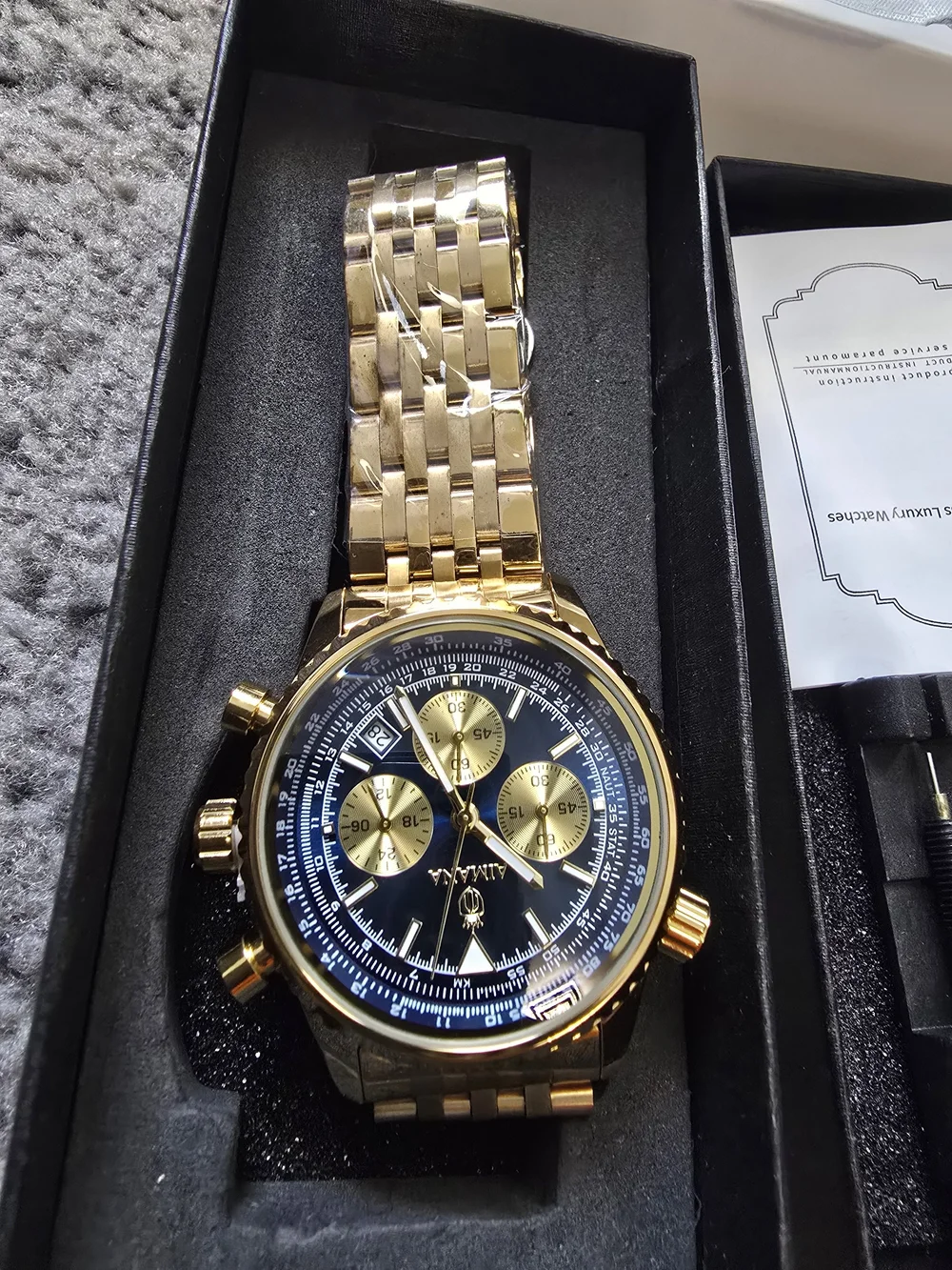 Gold Men's Chronograph Watch with Black Dial
